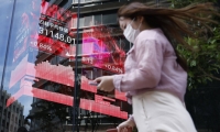 美股三大指数18日集体收跌